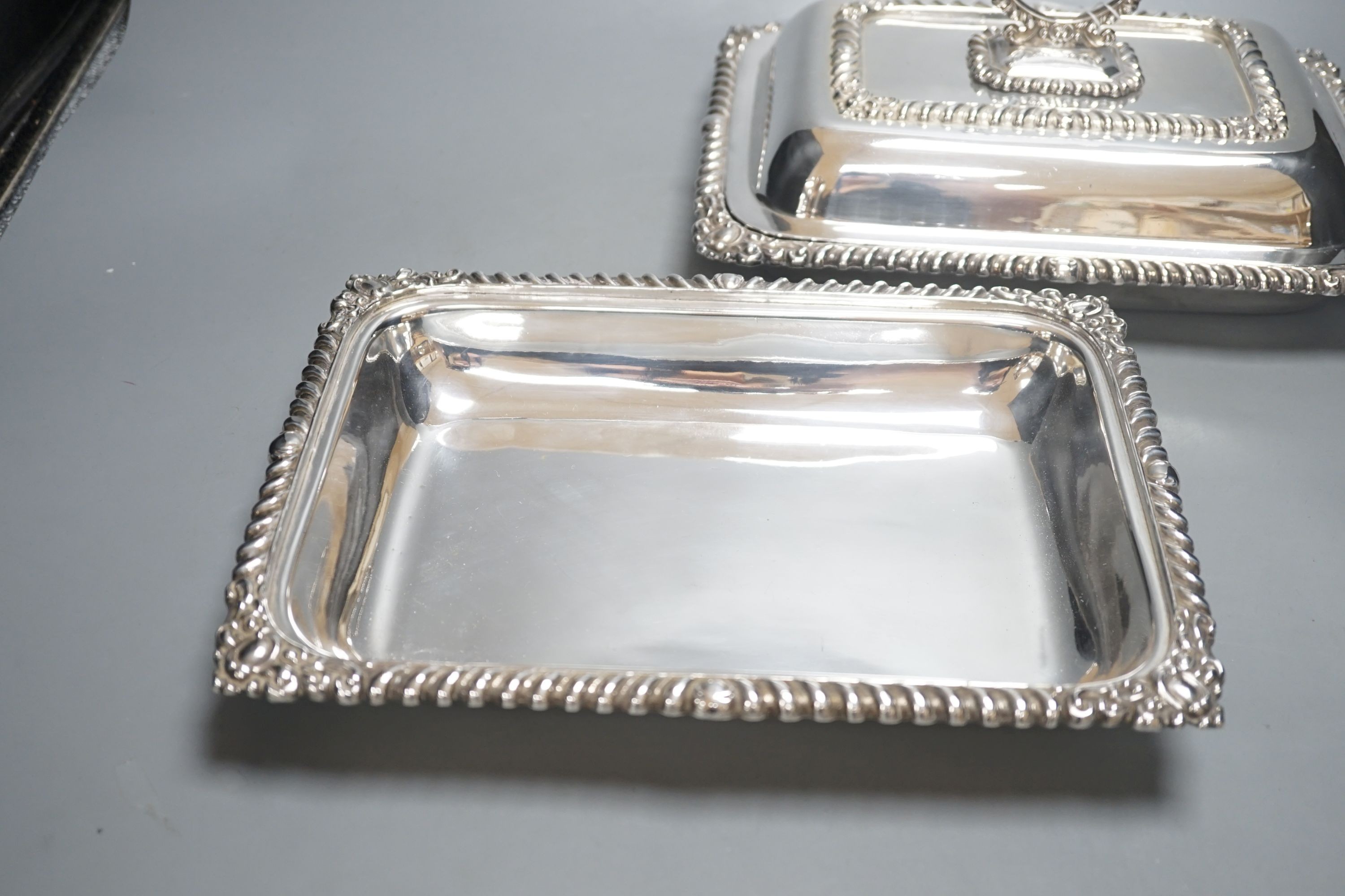 A pair of silver plated entree dishes, 28cm